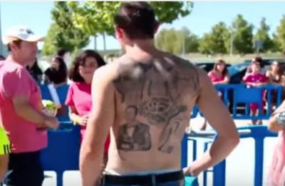 A guy has Cristiano Ronaldo tattooed throughout his back